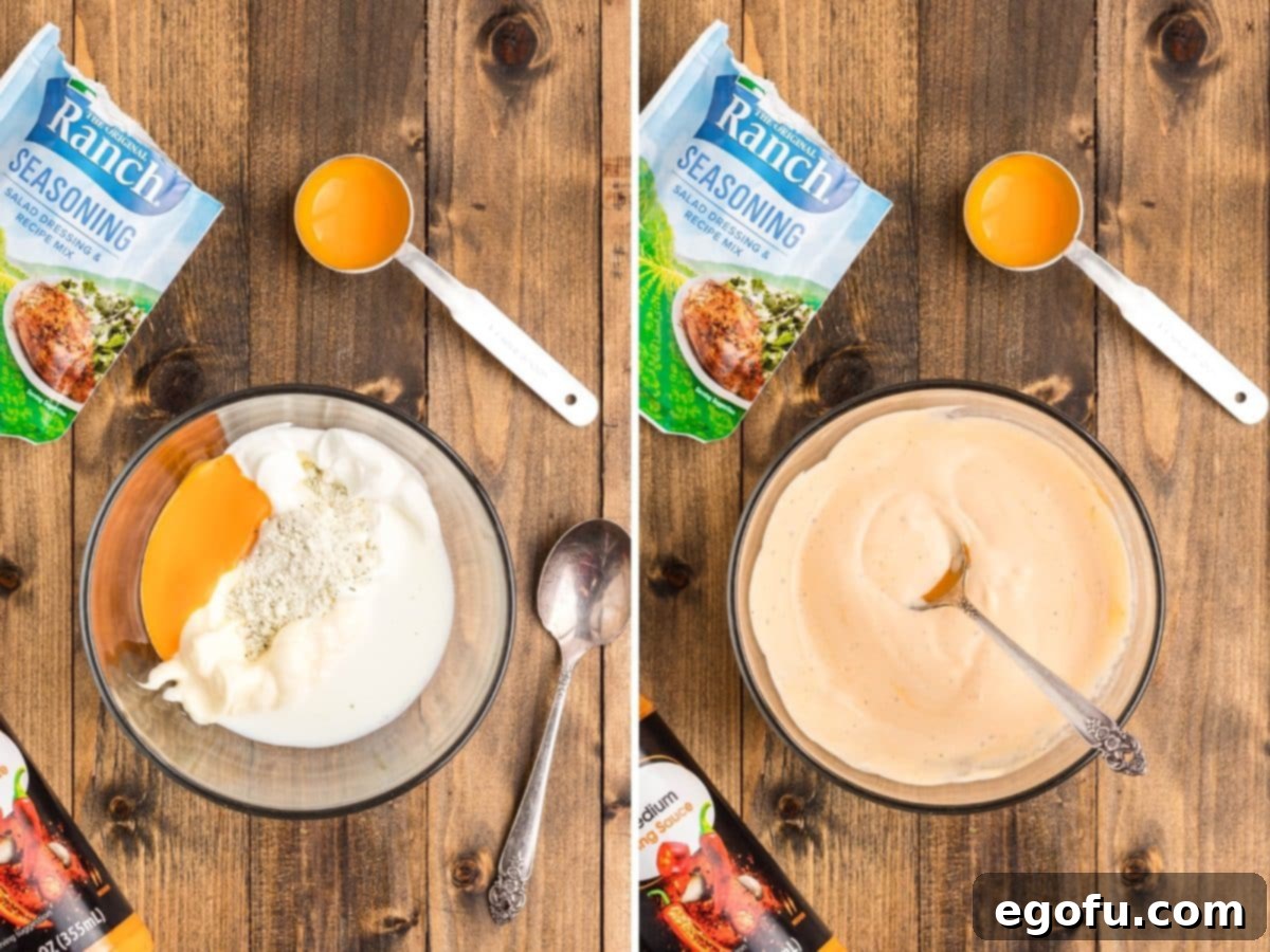 Buffalo sauce mixture being mixed together in a glass bowl with a whisk, showcasing its creamy texture.