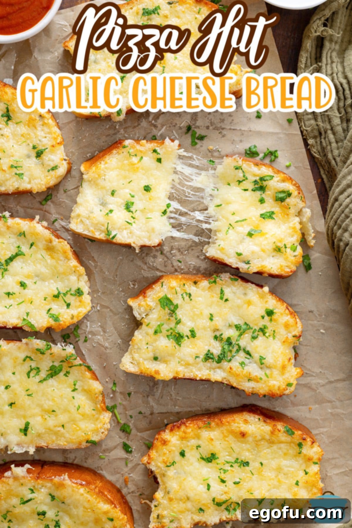 A few slices of copycat Pizza Hut Garlic Cheese Bread on a baking sheet.
