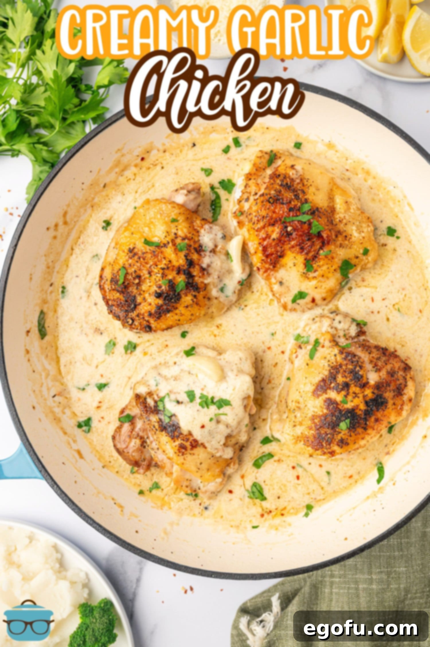 Creamy Garlic Chicken Delight 3 A large skillet filled with Creamy Garlic Chicken, showcasing the rich, golden-brown chicken thighs nestled in a luxurious garlic cream sauce, ready to be served.