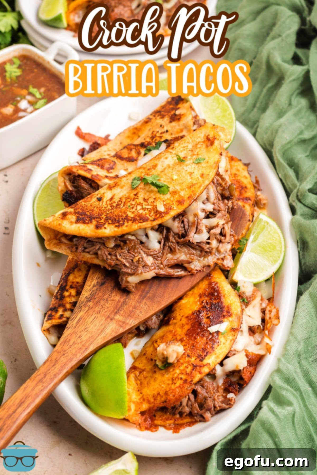 A serving platter with Crock Pot Birria Tacos.