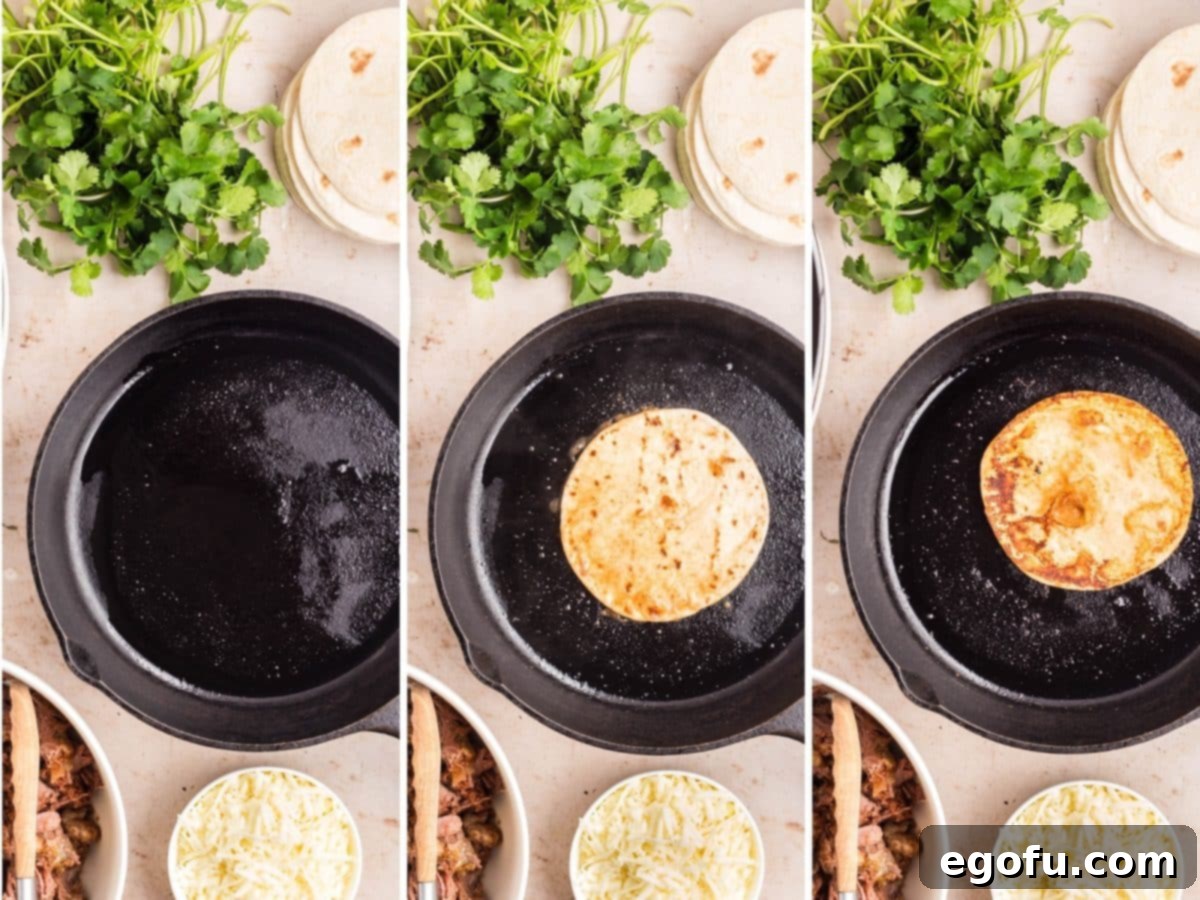 A cast iron skillet with oil cooking a tortilla shell on both sides.