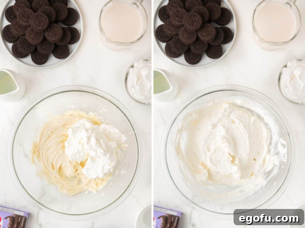 Whipped cream being added to the cream cheese mixture.