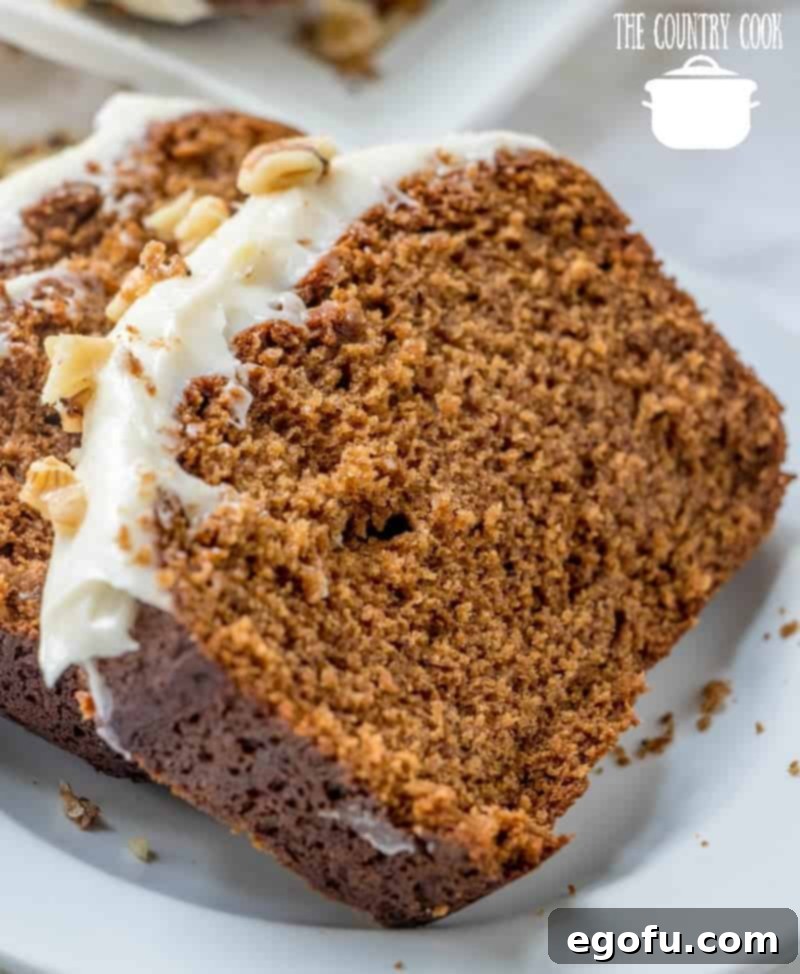 Starbuck's Gingerbread Loaf Cake, slices shown close up on a white plate.