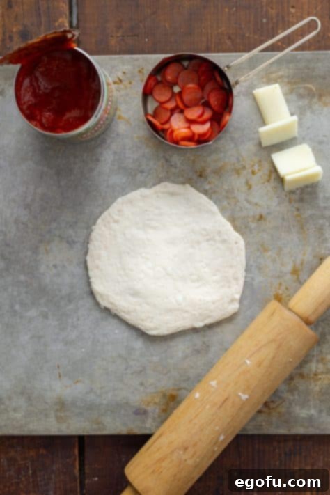 Biscuit dough rolled out with a rolling pin.