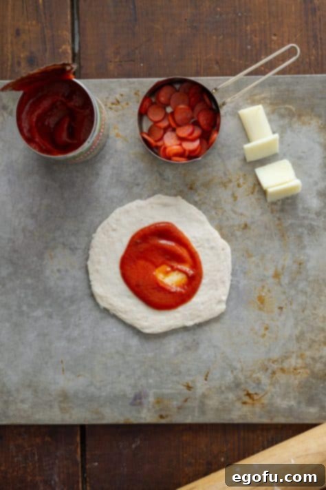 Biscuit dough with pizza sauce.