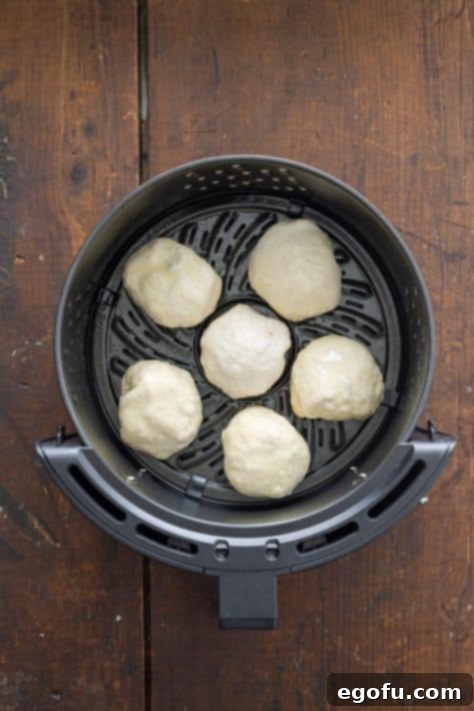 Unbaked pizza bombs in an Air Fryer.