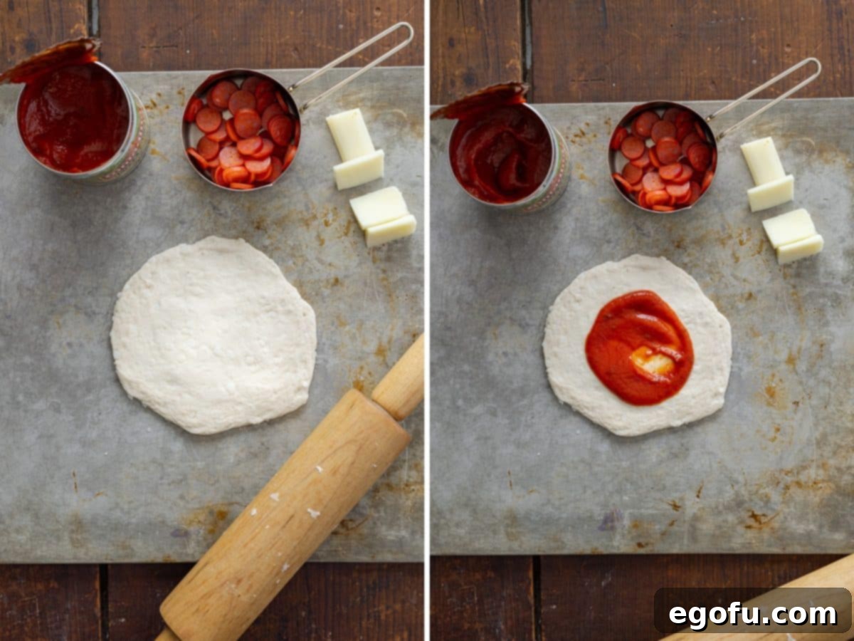 Biscuit dough rolled out with pizza sauce at its center.