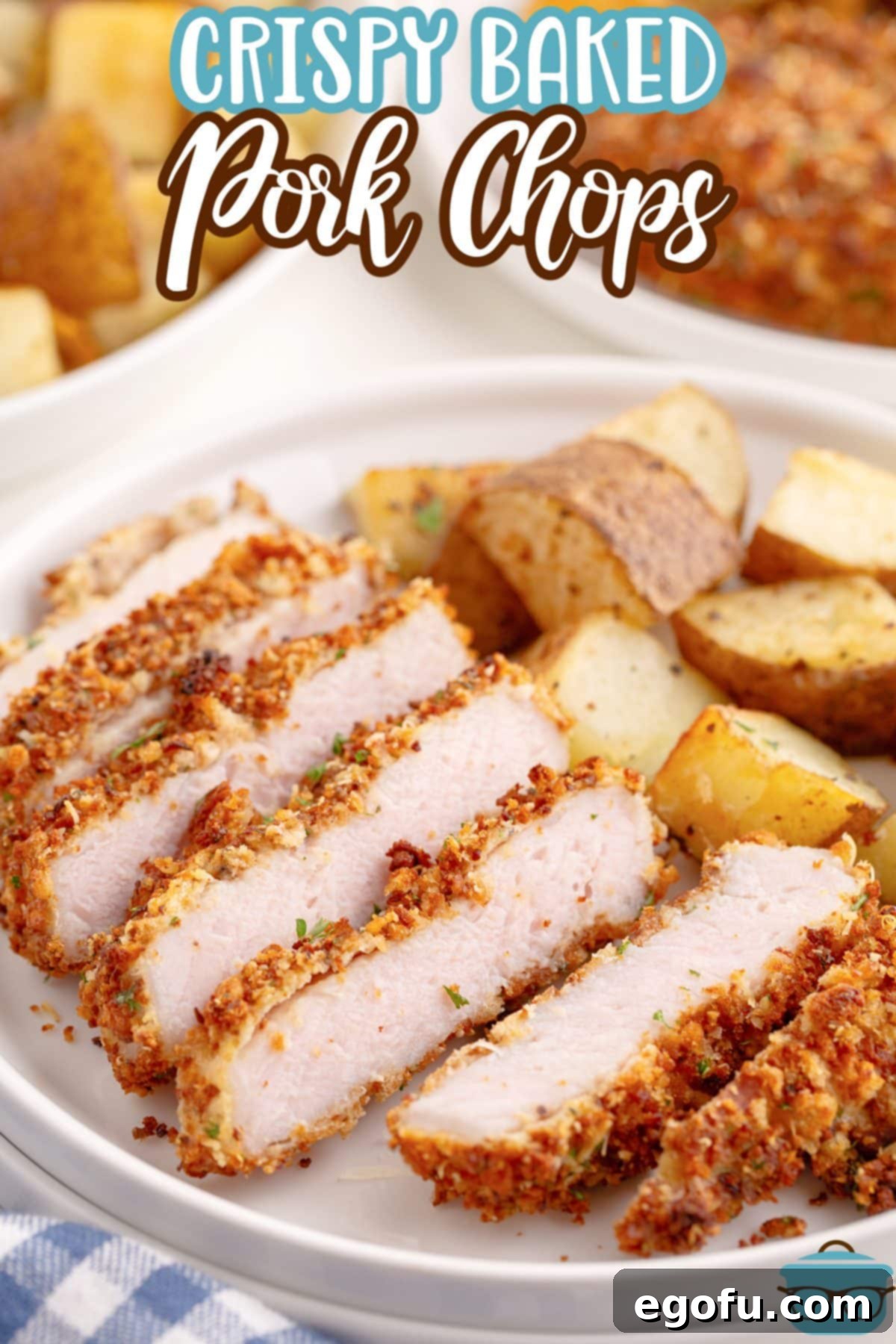 A plate with slices of Baked Pork Chops with a crispy coating.