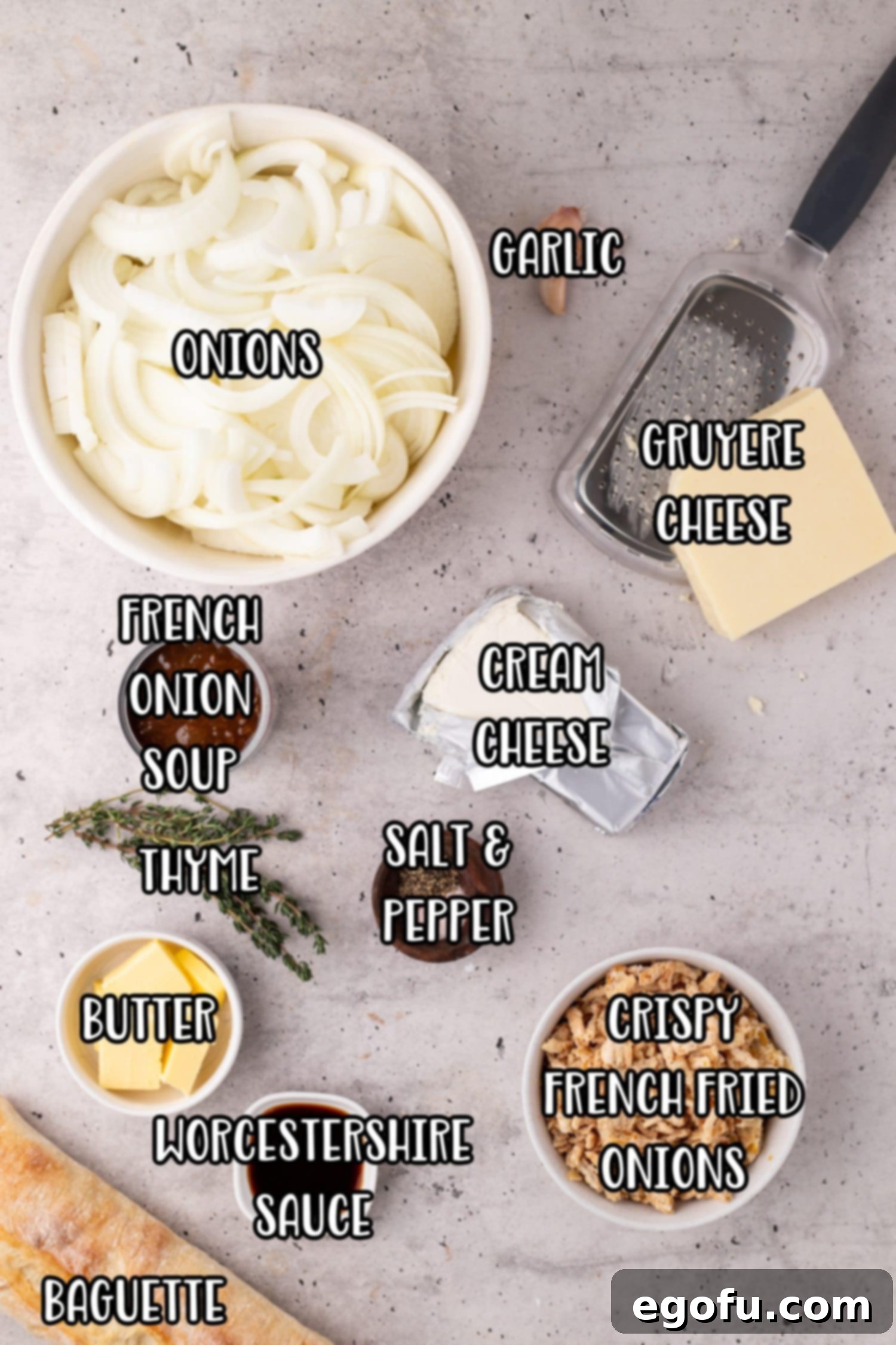 Onions, garlic, Gruyère cheese, French onion soup, cream cheese, salt, pepper, thyme, butter, Worcestershire sauce, baguette, and crispy French fried onions.