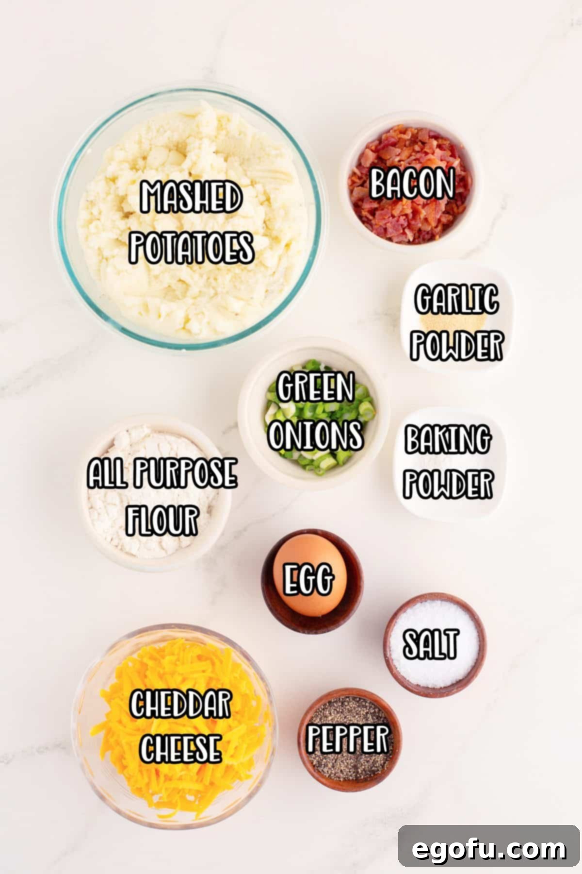 Crispy Potato Fritters 4 Mashed potatoes, cheddar cheese, green onion, bacon, egg, salt. Pepper, flour, baking powder, and garlic powder.