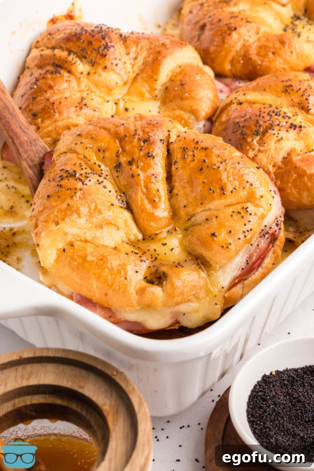 Close up looking at a Baked Ham and Cheese Croissant Sandwich.