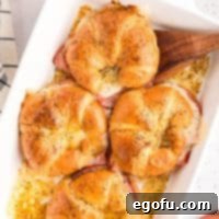 Looking down on a few golden brown Baked Ham and Cheese Croissants.