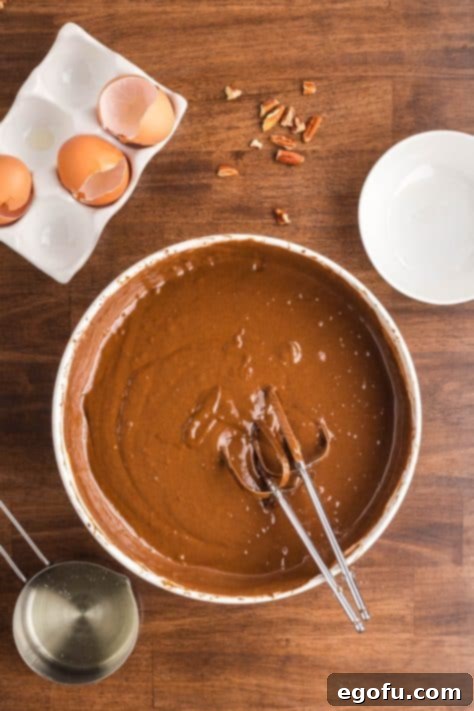Chocolate cake batter in a bowl.