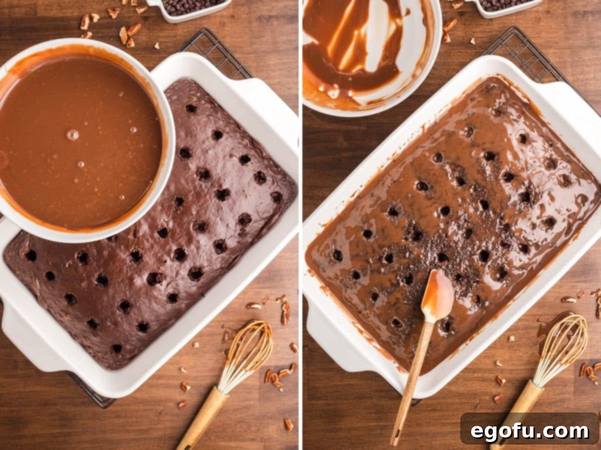 Rich chocolate sauce being poured and spread over a poke cake, allowing it to soak into the poked holes.