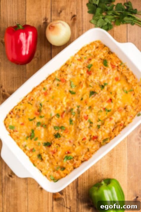 Cilantro on top of cheesy casserole in a baking dish.