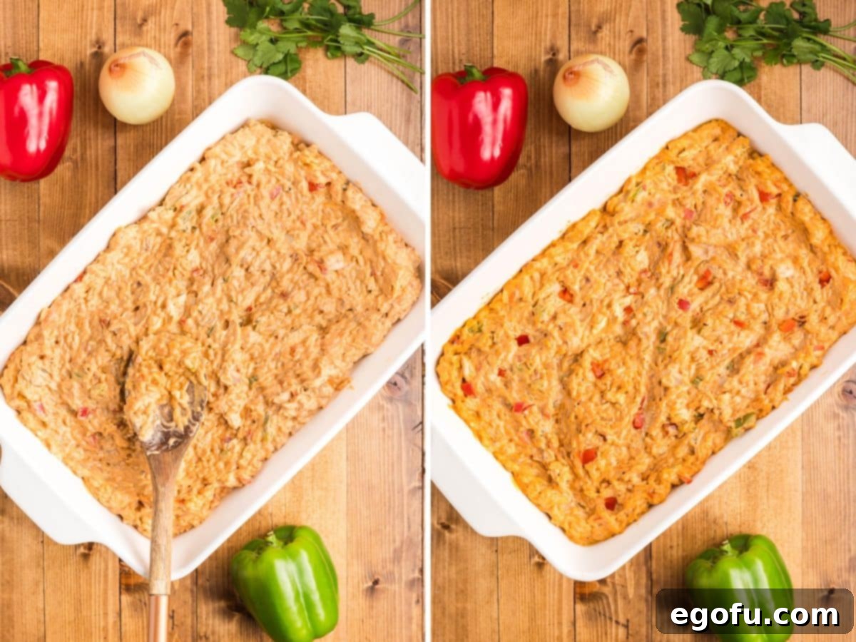 Creamy chicken mixture in a baking dish.