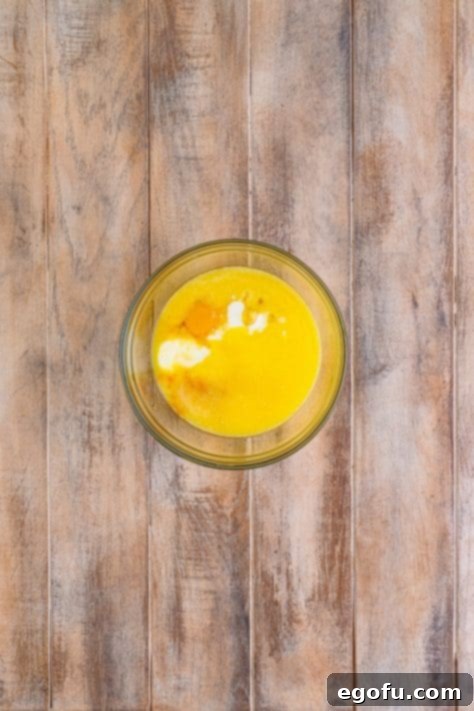 Starbucks Signature Cranberry Loaf 6 A bowl of wet ingredients to make a cranberry loaf with.