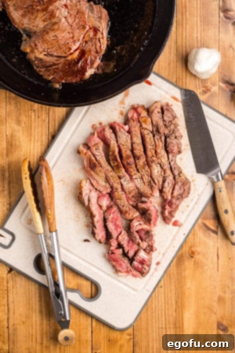 Ribeye steaks being sliced.