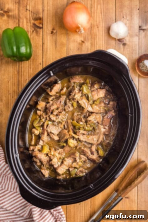 A Crockpot full of Philly Cheesesteak fixings.