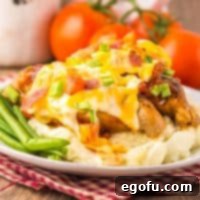 A plate of Crock Pot Monterey Chicken and side dishes.