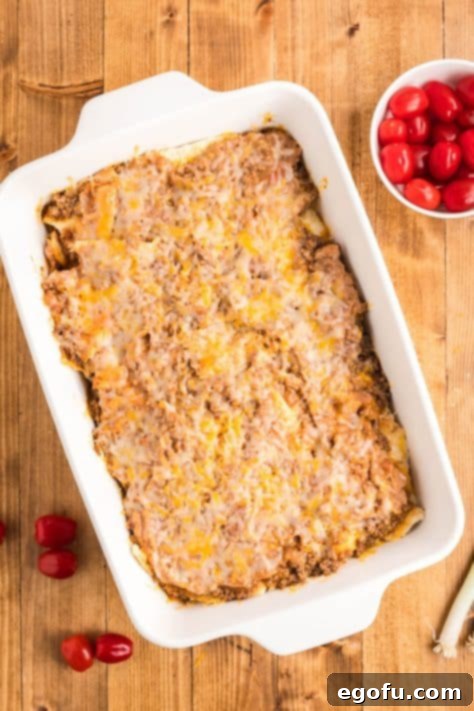 The fully layered Mexican pizza casserole, baked to perfection with melted cheese.