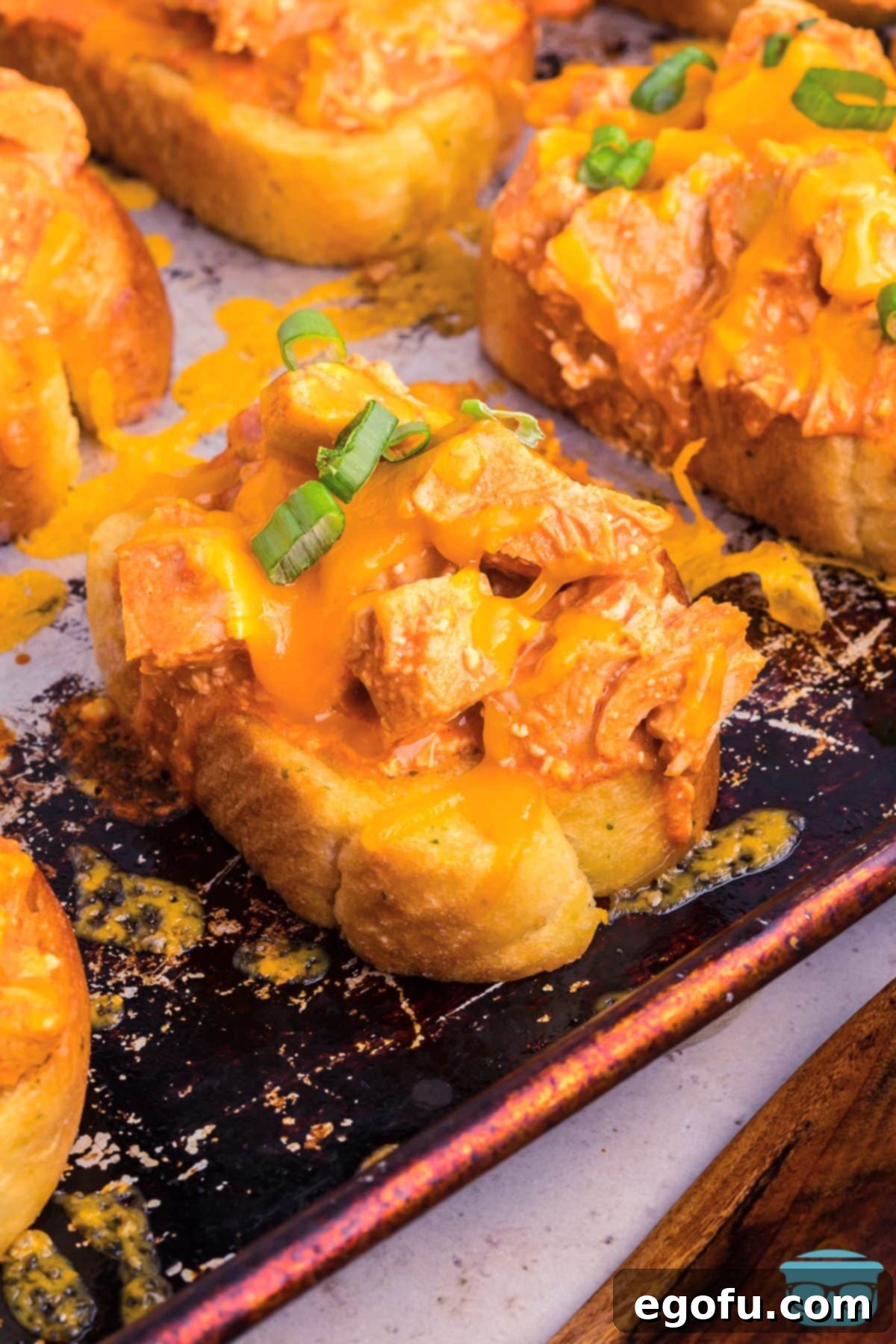 A big piece of Texas Toast topped with Buffalo Chicken mixture.