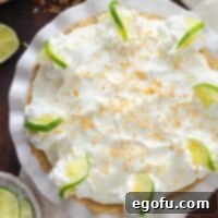 Looking down on a perfectly crafted Key Lime Cream Pie, ready to be served.