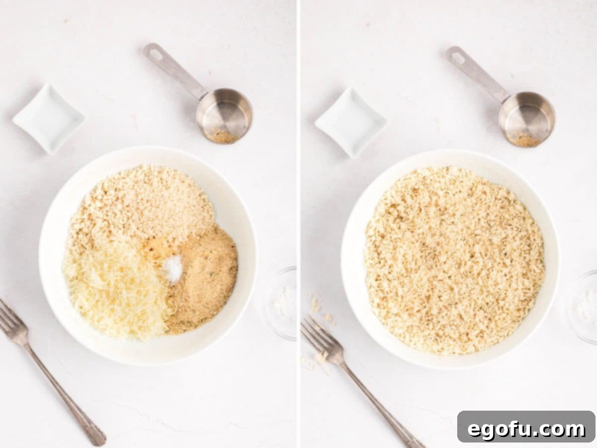A shallow bowl with panko bread crumbs, grated parmesan cheese, Italian panko bread crumbs, garlic powder, and 1/2 teaspoon of salt being mixed together.