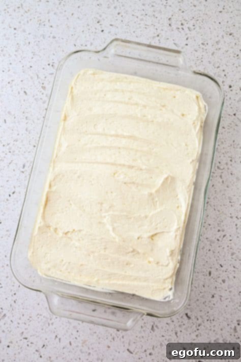 Cream cheese layer over the cookie layer.