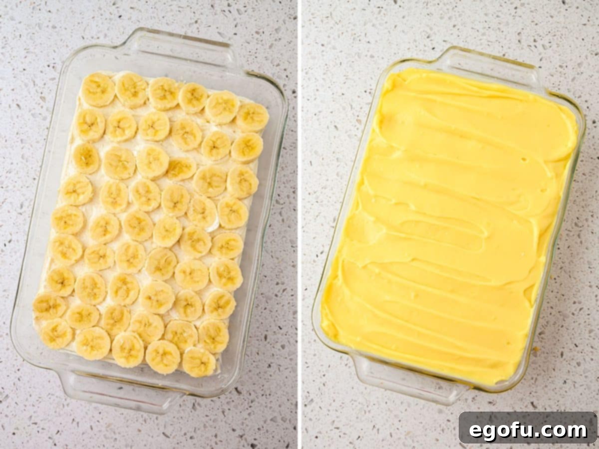 Sliced ripe bananas being added as a layer on top of the cream cheese filling in the layered dessert.