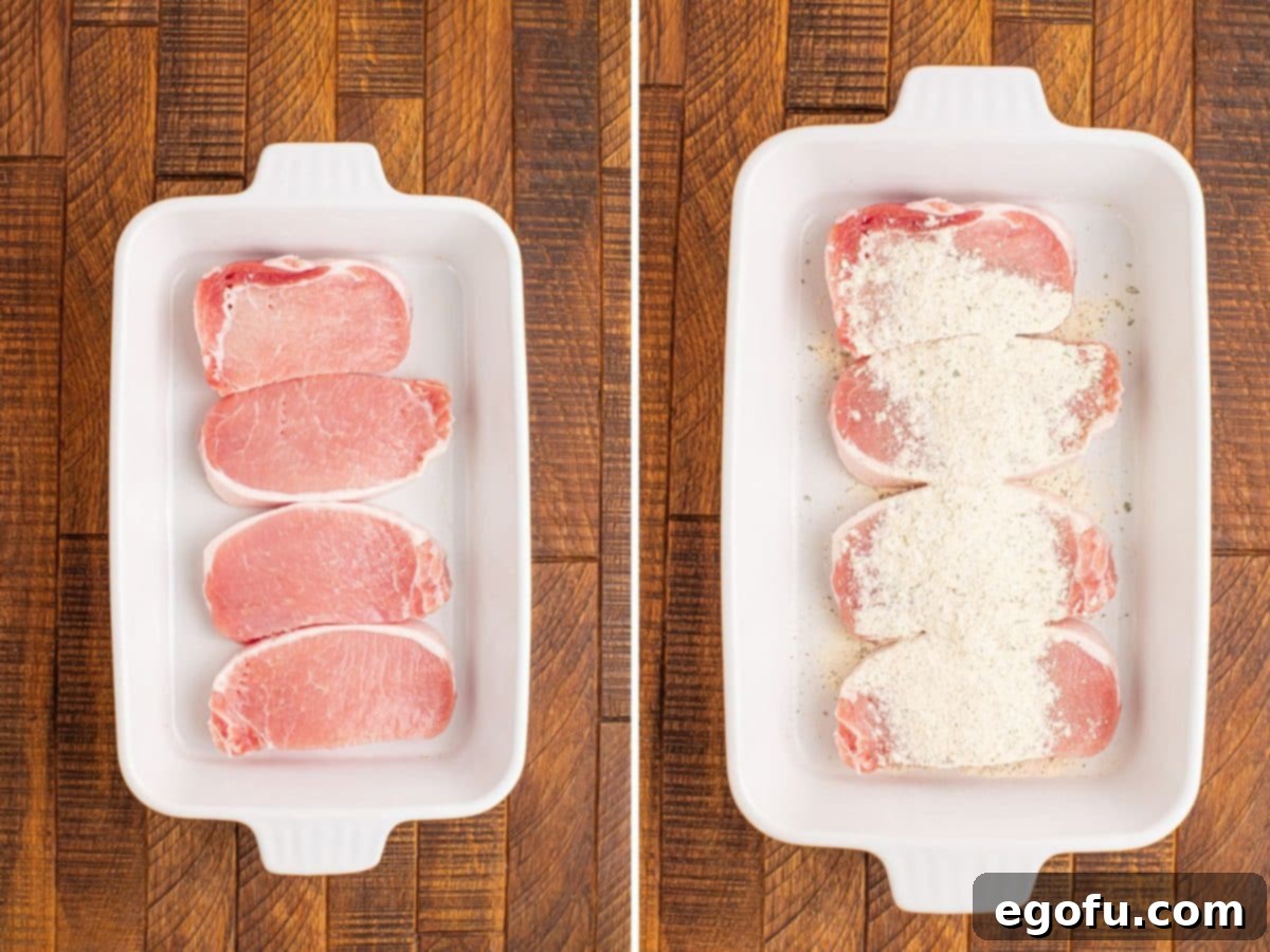 Golden Ranch Butter Pork Chops 5 Pork chops covered in ranch seasoning in a baking dish.