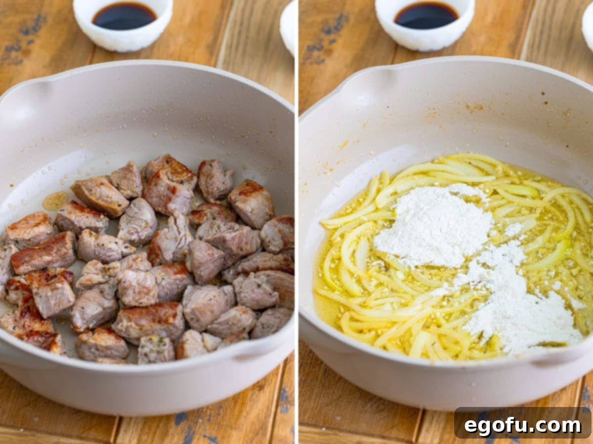 Tender Pork Bites in Rich Gravy 6 Seared pork bites and thinly sliced onions simmering in a rich butter and flour mixture in a skillet.