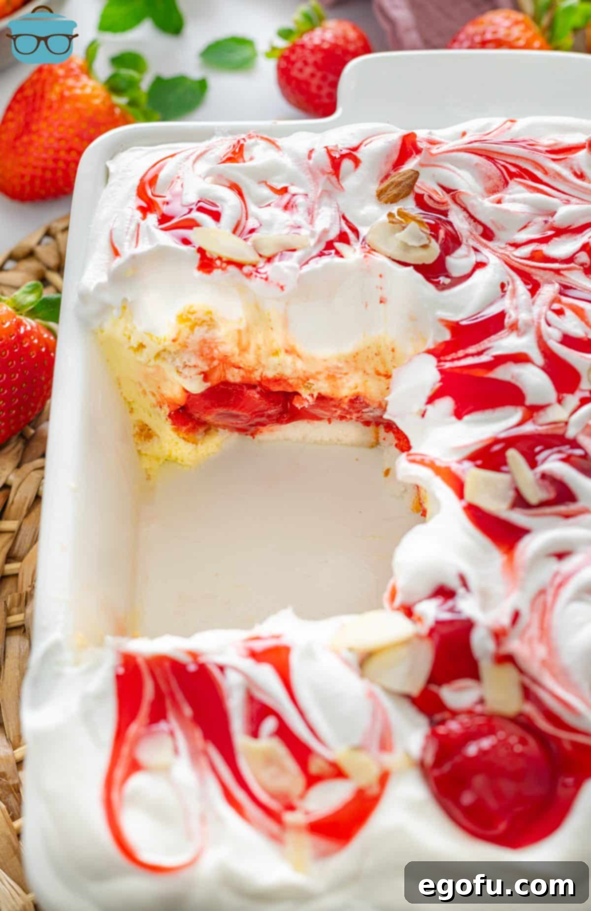 Cloud Nine Indulgence 2 A loaf pan with Heaven on Earth Cake and a slice removed.