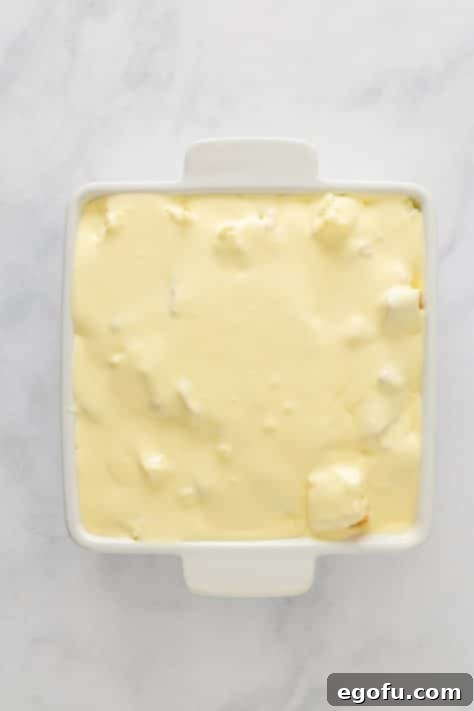 Cloud Nine Indulgence 14 Pudding mixture on top of dessert.