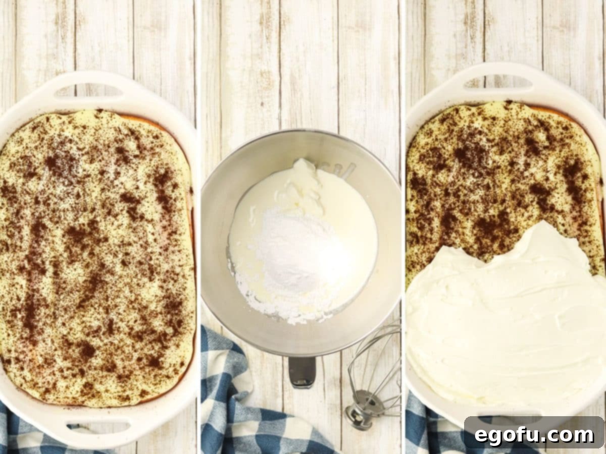 Espresso Kissed Tiramisu Poke Delight 8 A layer of Tiramisu cake with homemade whipped topping being made and spread over the cake.