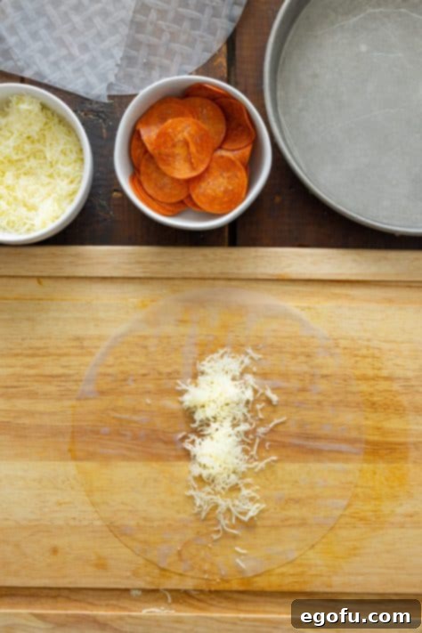 Cheese on a spring roll wrapper.