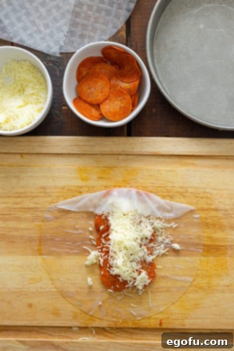 A pepperoni roll being wrapped up.