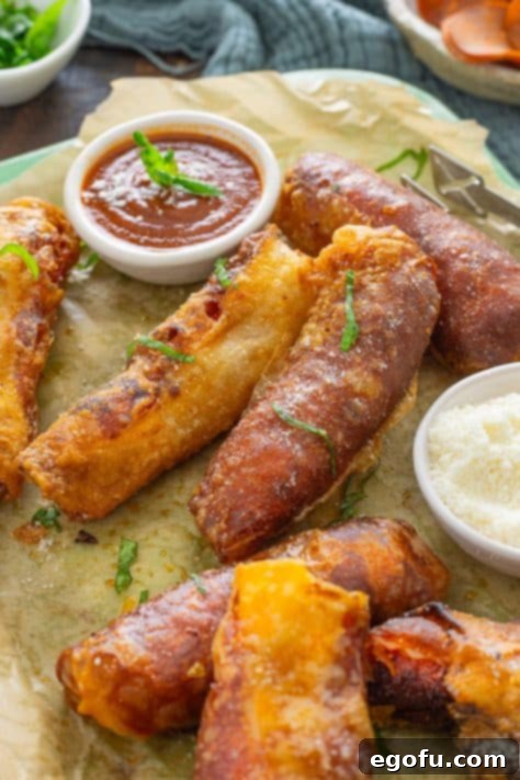 A small collection of Pepperoni Pizza Spring Rolls.