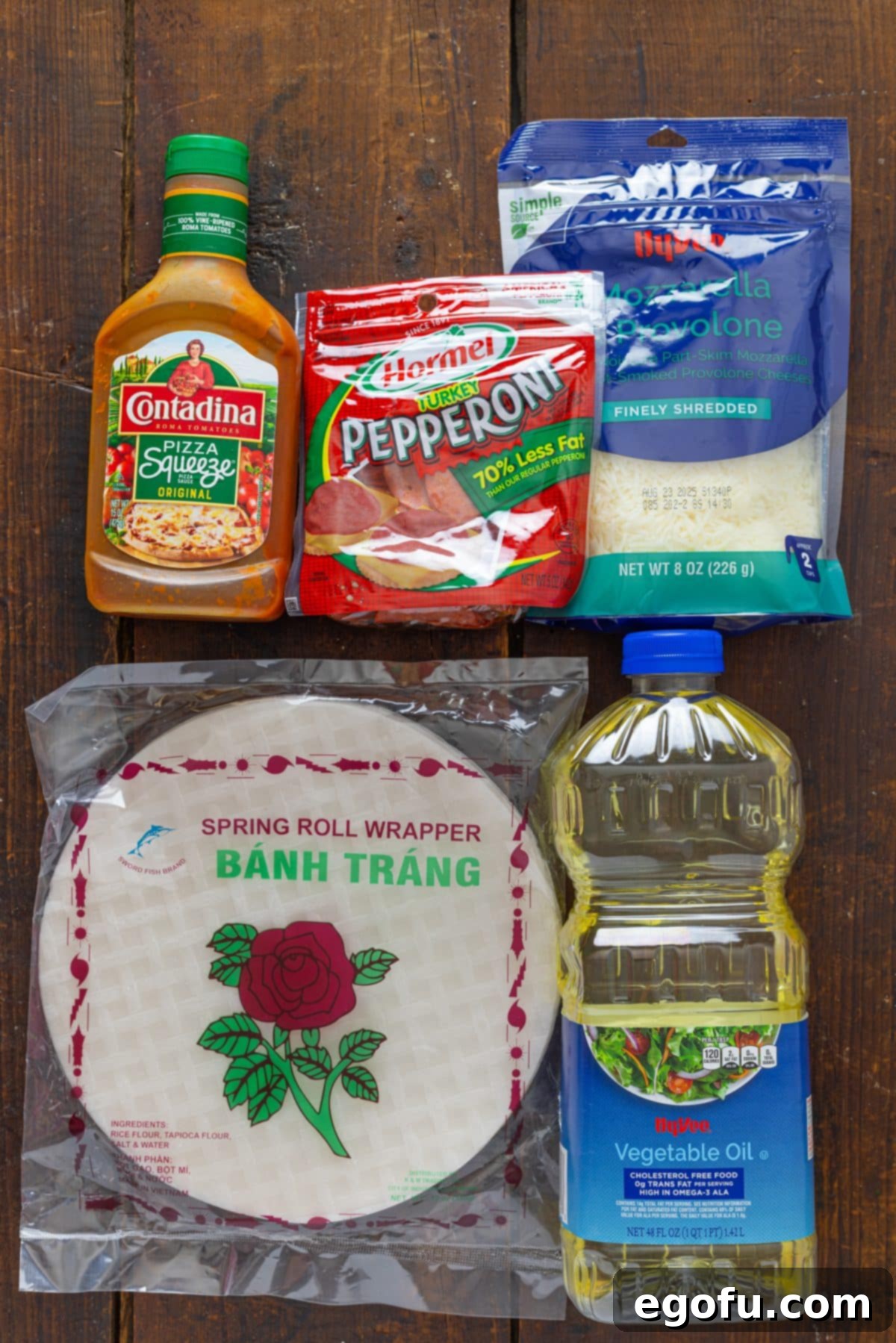 Spring roll wrapper, shredded cheese, pepperoni, marinara sauce, and vegetable oil.