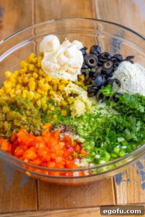 All the ingredients for Poolside Dip placed in a large mixing bowl, ready to be combined.