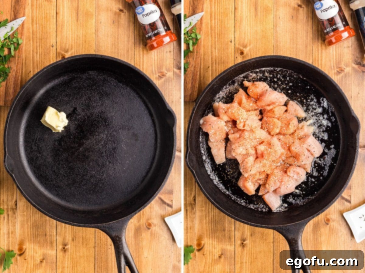 Smoky BBQ Chicken and Crispy Potato Skillet 7 A cast iron skillet with butter and chicken cooking.
