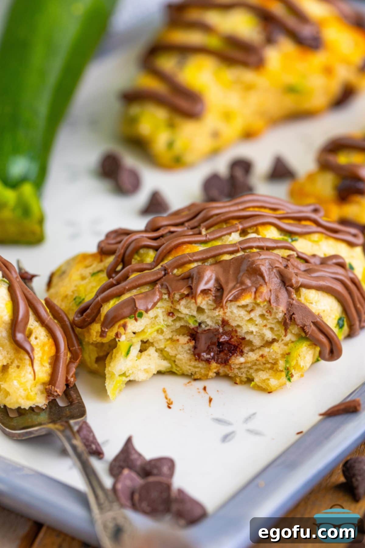 A Chocolate Chip Zucchini Scone with a bite missing.