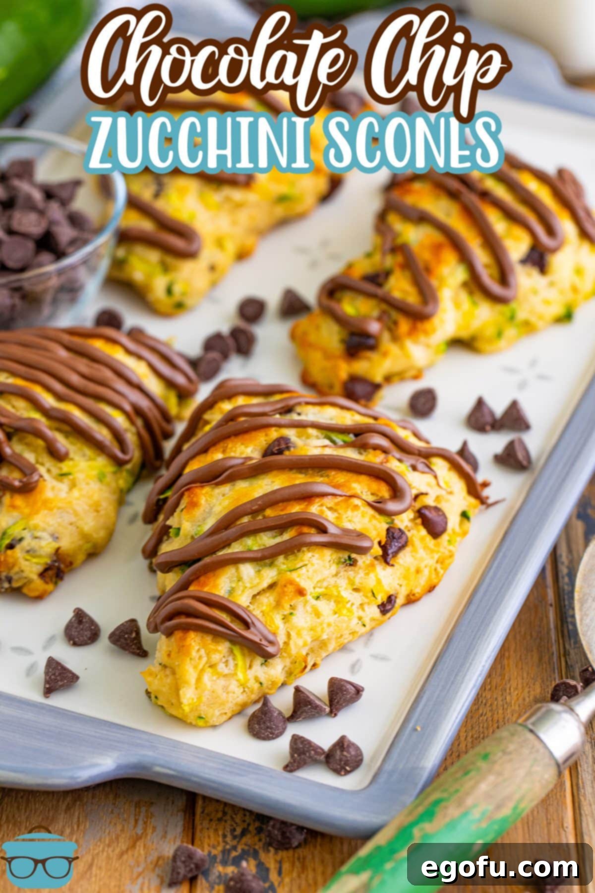 A few Chocolate Chip Zucchini Scones on a baking sheet.