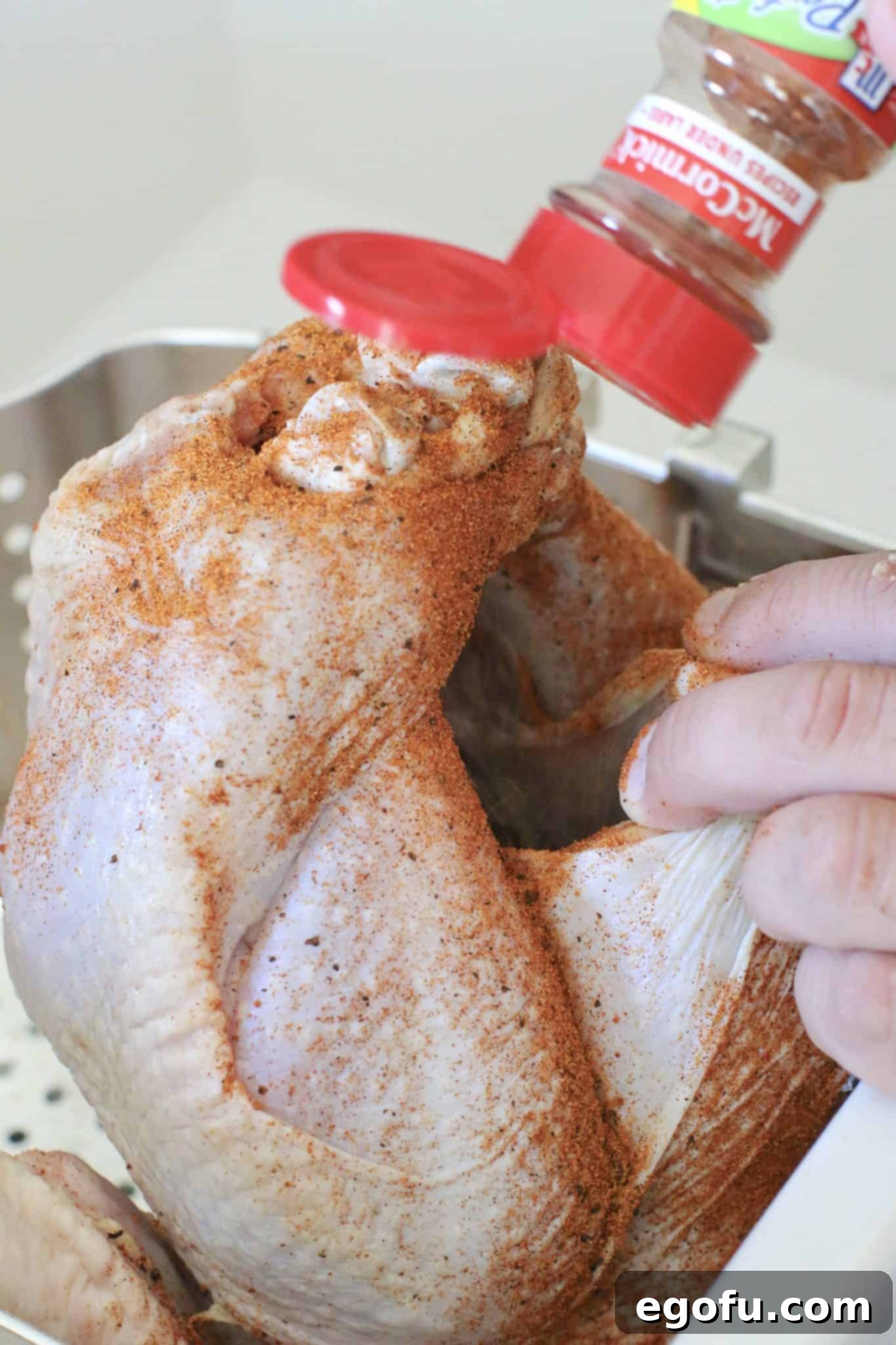 sprinkling rotisserie chicken seasoning inside the cavity of the turkey. 