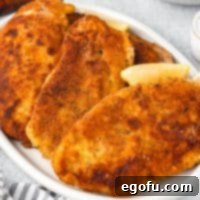 Looking down on a serving platter of Chicken Schnitzel.