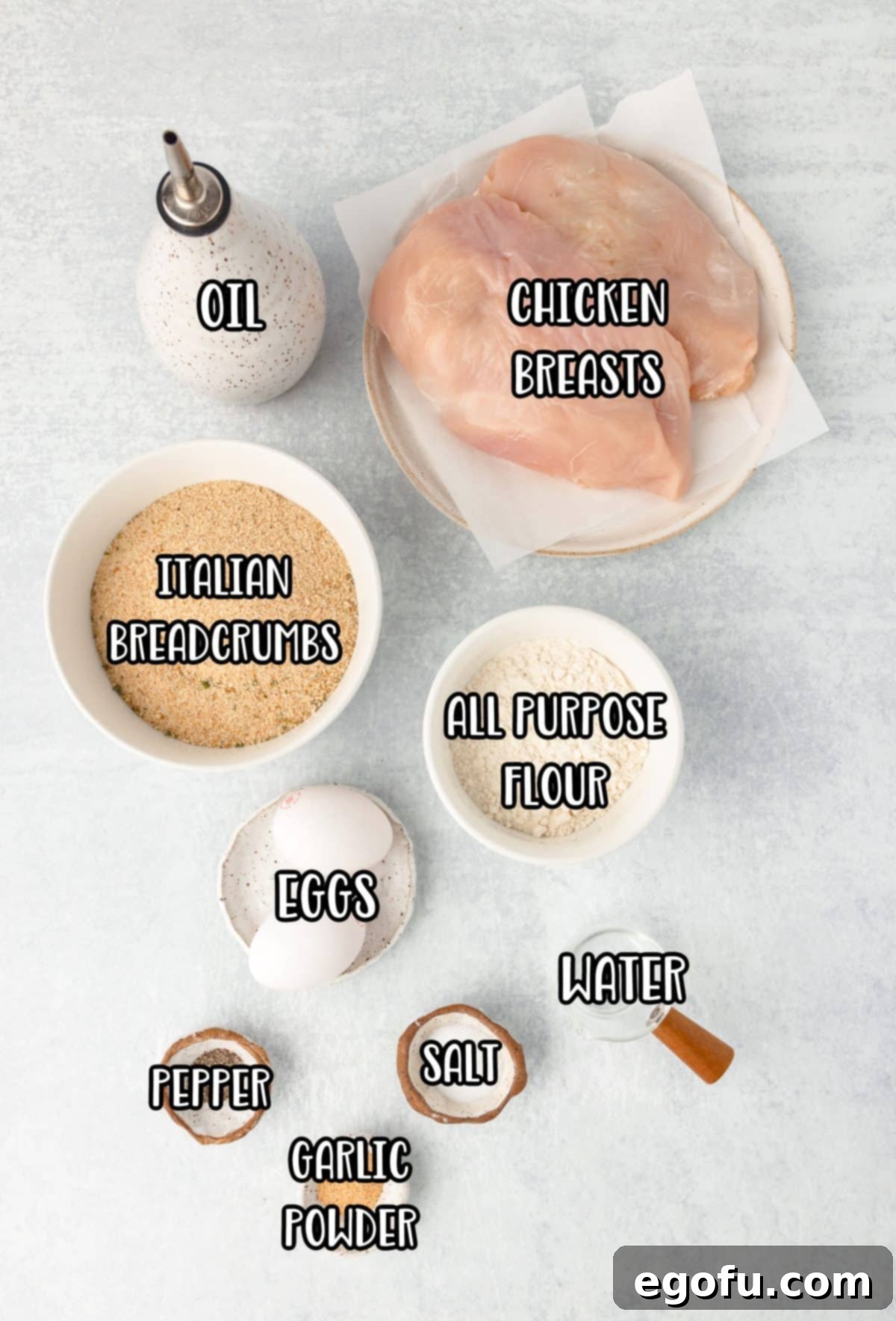 Chicken breasts, Italian breadcrumbs, all purpose flour, oil, eggs, water, salt, pepper, and garlic powder.