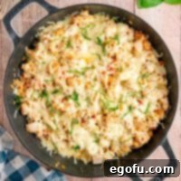 Marry Me Chicken and Rice in a skillet, close up.