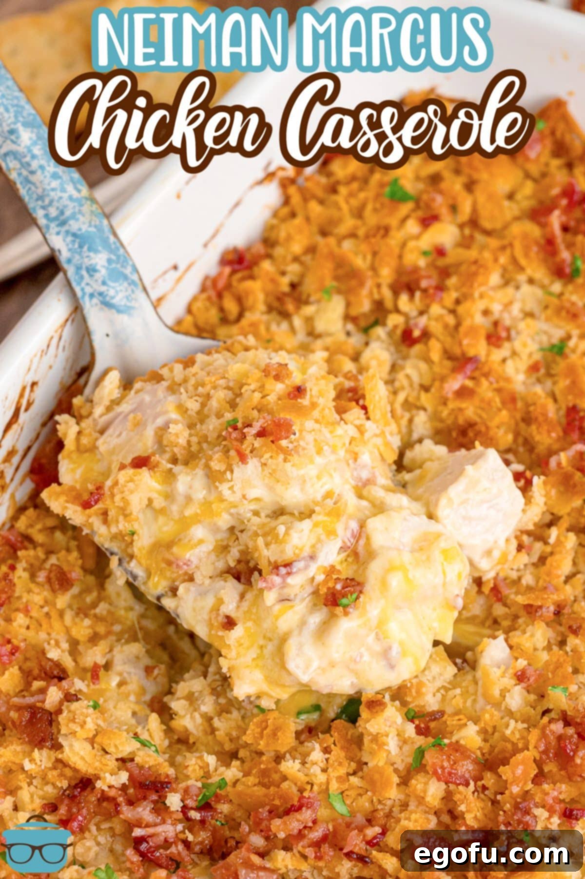 A baking dish with a serving utensil grabbing a scoop.