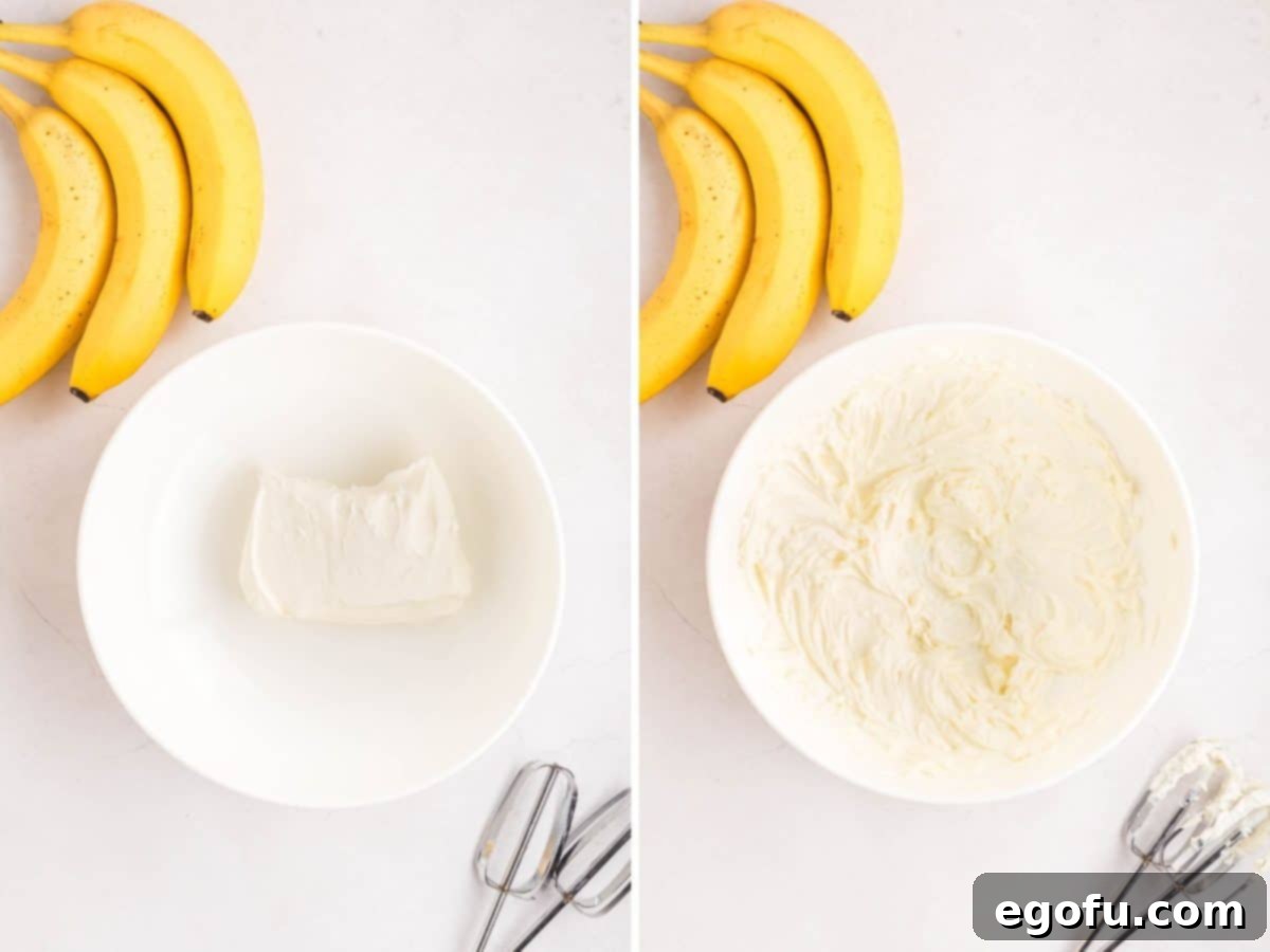 Softened cream cheese being whipped until smooth in a mixing bowl with an electric hand mixer.