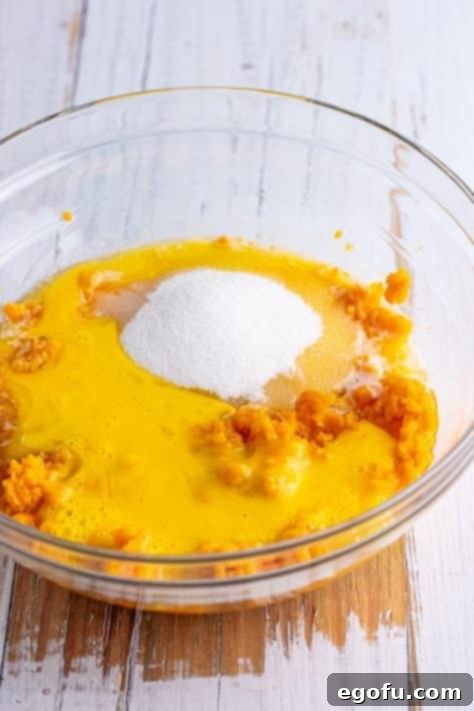 A large bowl containing the combined sweet potato mixture, smooth and ready.